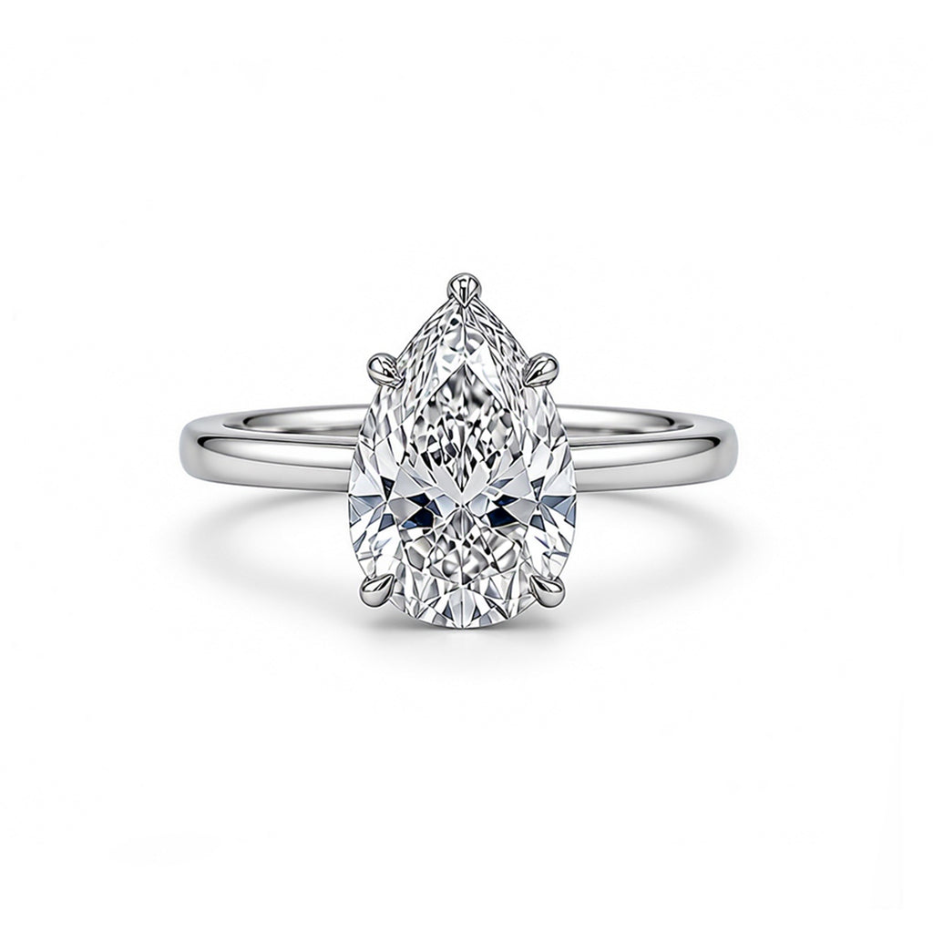 Elegant Pear Cut Solitaire White Gold Ring