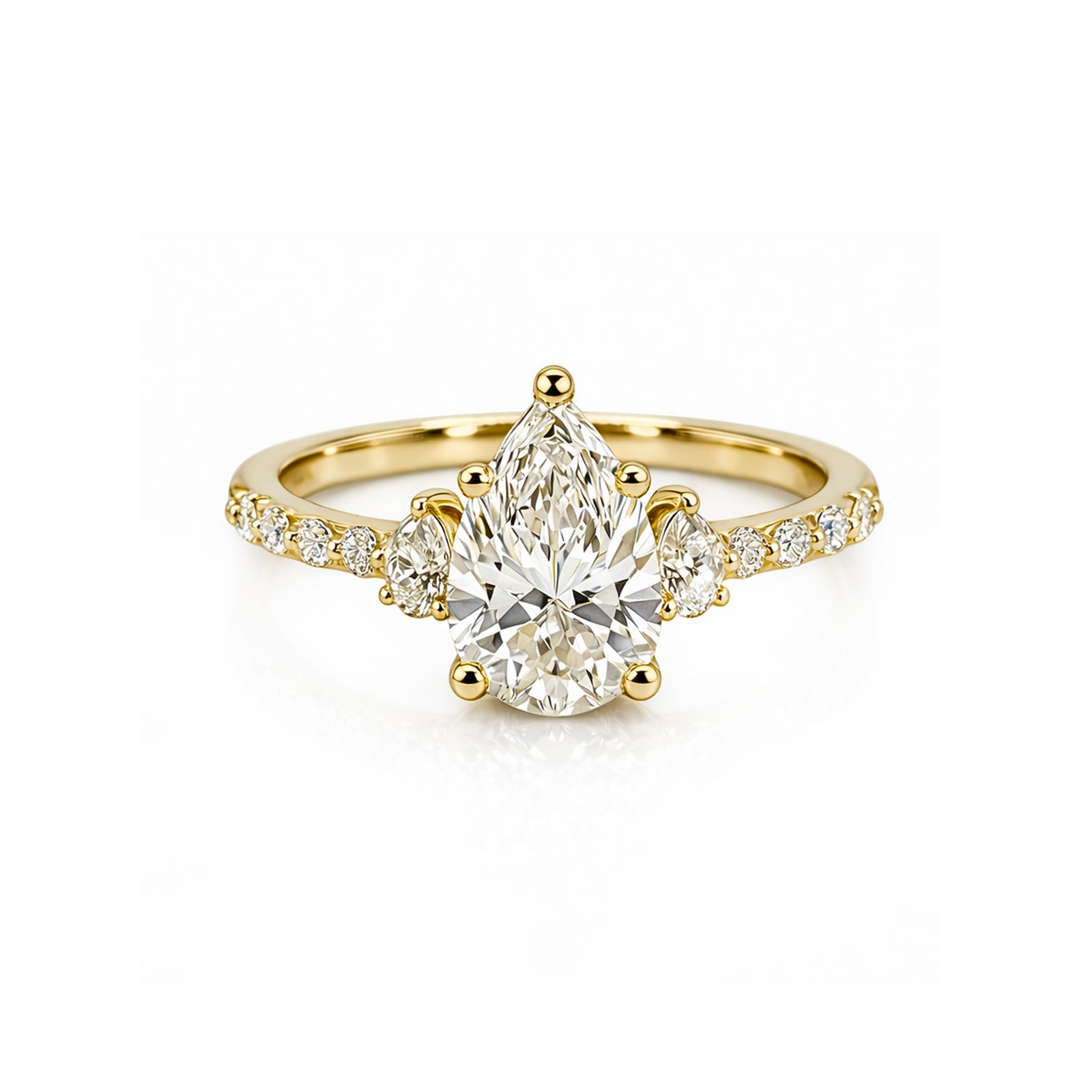 Yellow Gold Pear-Shaped Three-Stone Ring