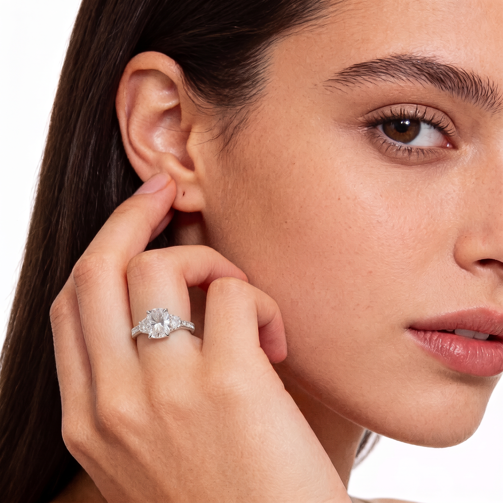 14K longated Cushion Cut Three-Stone Engagement Ring